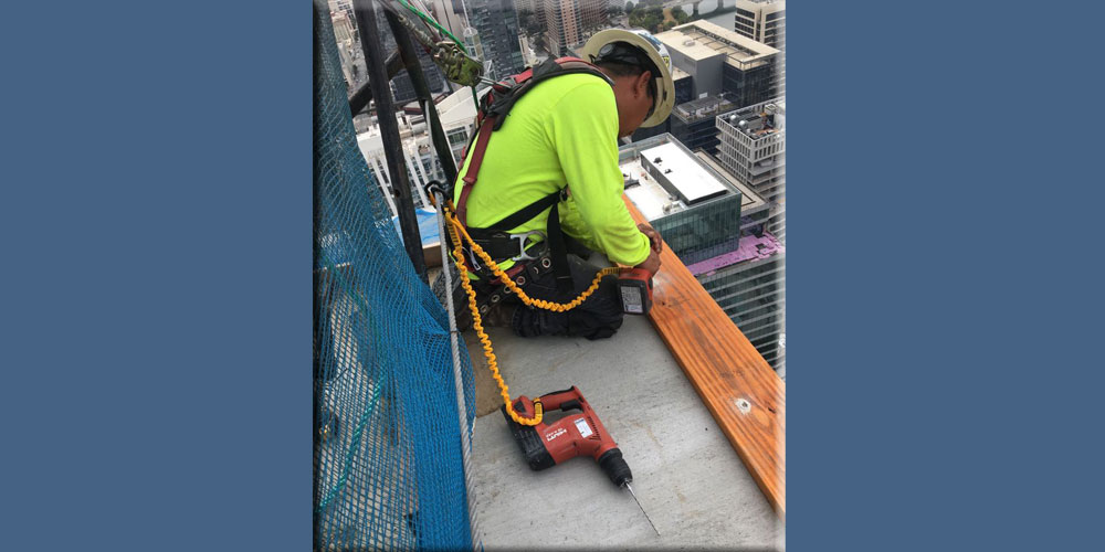 TFW Roofing Expert Working on 58 Story Building